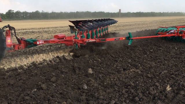 Kverneland RN 100 9 корпусов с пакером DP + Versatile 3535 Buhler смотреть онлайн