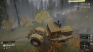 Трактор К 700 вытаскиваю застрявший в лесу лесовоз. Игра SnowRunner