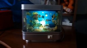 Электрический аквариум -рыбки.