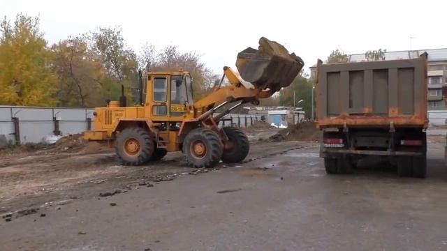 Фронтальный погрузчик в действии смотреть онлайн