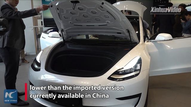 Tesla unveils Shanghai-made Model 3 electric vehicle смотреть онлайн