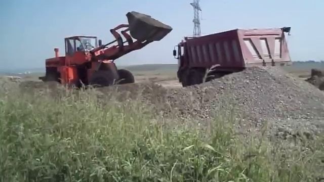 Stalowa Wola L34 loading Iveco Eurotrakker смотреть онлайн