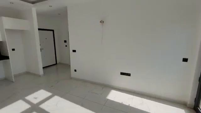 Новостройка за 70000 € 1+1 (45 м²) до моря 500 м. Недвижимость в Алании Турция Махмутлар смотреть онлайн