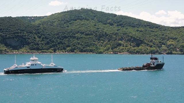 Offshore Supply Ship DIAVLOS FORCE Tows A Yacht At Sea