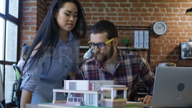 Young Architects Designing House Stock Video