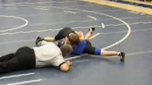 Wrestling girl pins boy