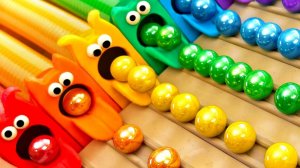 Видео для детей. Скатываем разноцветные шарики прямо в рот чудовищем. Детям