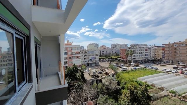 Махмутлар ЦЕНТР недвижимость Турции Аланья новостройка 2+1/90м²/178тыс€ смотреть онлайн