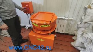 Галтовочная вибромашина торового типа