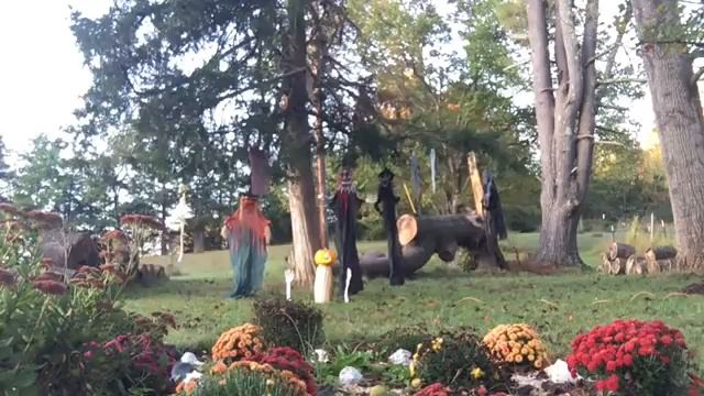 Hidden Camera Captures Lurking Forest Figures Investigating Family Halloween Lawn Display смотреть онлайн