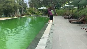 White Nike sneakers, purple dress, green water • Wetlook girl swimming in pool • Wet dress