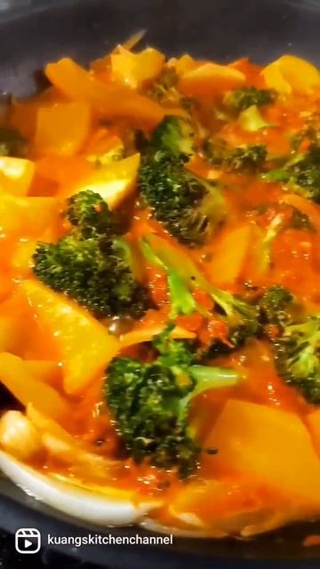 Squid Ink Spaghetti In Ajvar Red Pepper Sauce With Seared Salmon And Zucchini