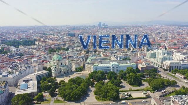 Inscription on video. Vienna, Austria. Karlskirche is a Catholic church located in the southern par смотреть онлайн