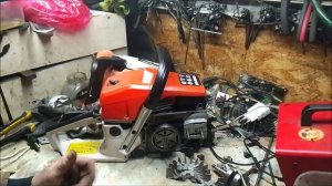 Как выглядит бюджетная бензопила.Профиль,фас...)