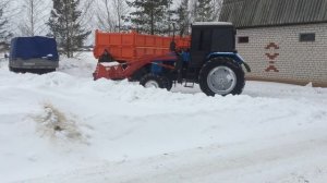 Убираем снег на мтз 1025 с кунам