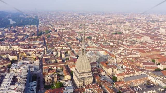 Turin, Italy. Flight over the city. Mole Antonelliana - a 19th-century building with a 121 m high d смотреть онлайн