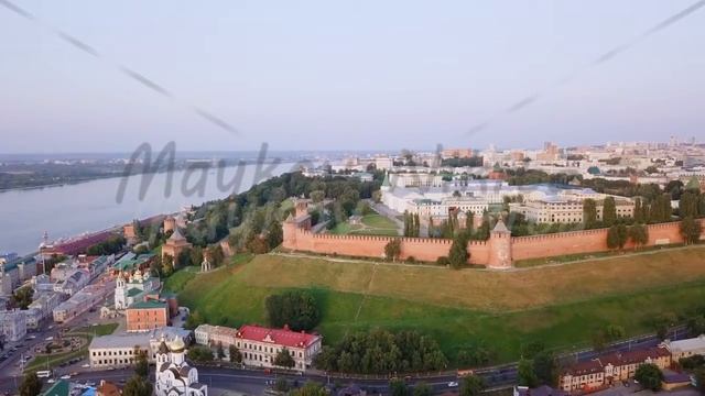 Aerial view of the Nizhny Novgorod Kremlin from the river side during sunset. Nizhny Novgorod, Russ смотреть онлайн