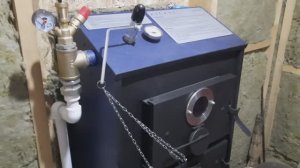 Монтаж котла в стену. Разводка отопления. Твердотопливный котел КОСМОС длительного горения.