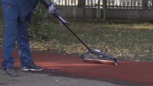 Укладка покрытия из резиновой крошки