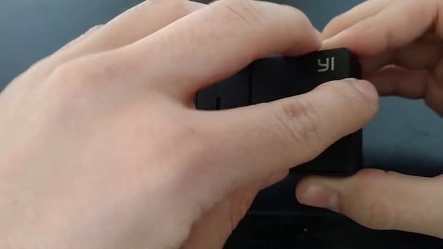How to insert an SD card to a YI action camera смотреть онлайн