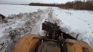 Чистим снег. Вытаскиваем погрузчик из грязи. Буксируем Камазы.