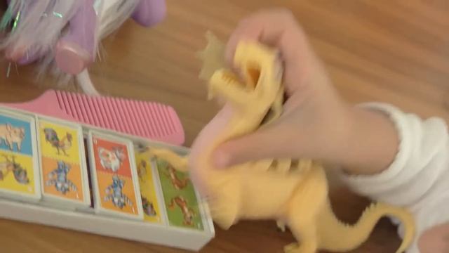 cannes france 18 06 2016 childs hand with toy dragon kid is playing creature from the смотреть онлайн