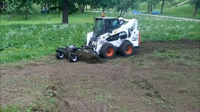 BOBCAT S770 С ПОЧВЕННЫМ АЭРАТОРОМ BOBCAT SOIL CONDITIONER