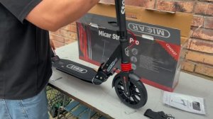 Сборка и настройка двухколесного самоката с ручным дисковым тормозом Micar Storm Pro.