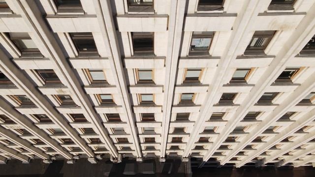 urban architecture many windows of a building slow 8XDE2X9 смотреть онлайн
