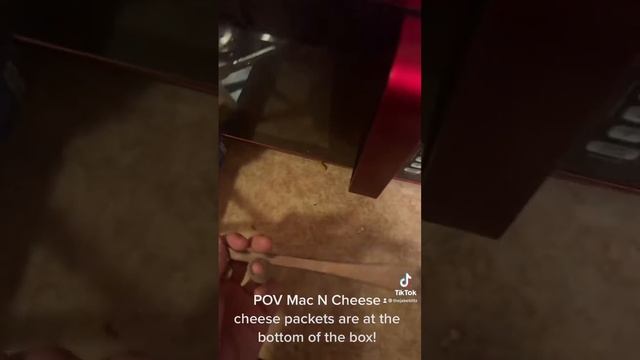 POV of Mac N Cheese cheese packets being at the bottom of the box. смотреть онлайн