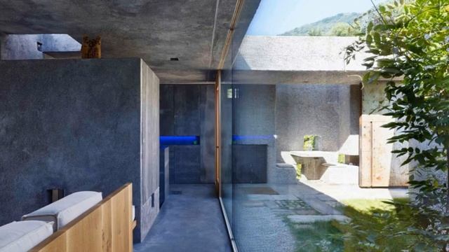 Tiny Concrete Bunker Opens to a 3-Story Home Filled With Light смотреть онлайн