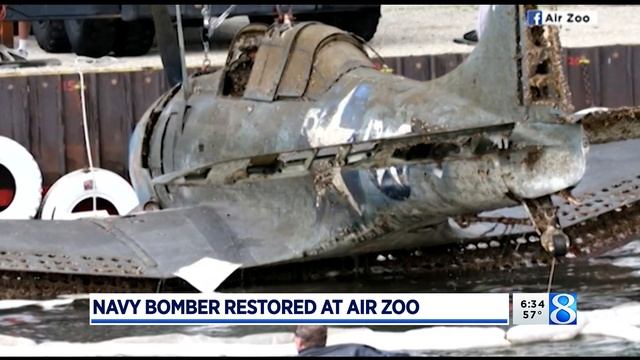 Restored at Air Zoo, Navy bomber bound for Pearl Harbor museum смотреть онлайн