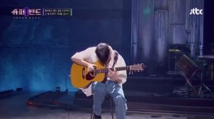 Потрясающе. Отличное исполнение на гитаре песни Ким Джин-сана  Ворона