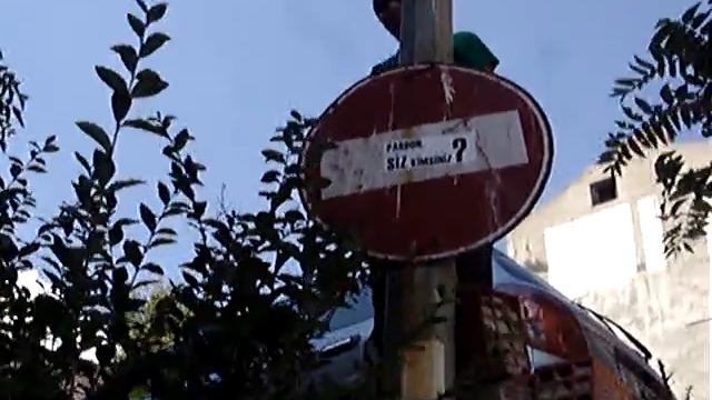 Exociti- Putting Up A Sticker In Cihangir