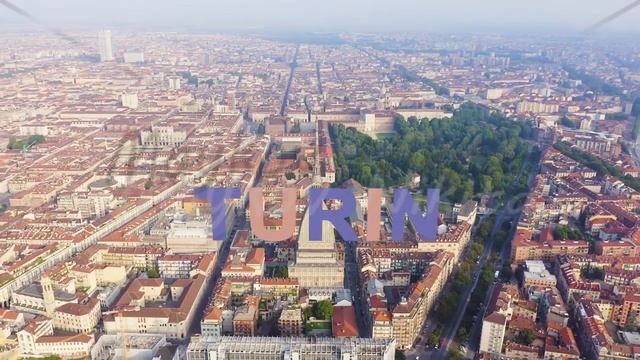 Inscription on video. Turin, Italy. Flight over the city. Mole Antonelliana - a 19th-century buildi смотреть онлайн