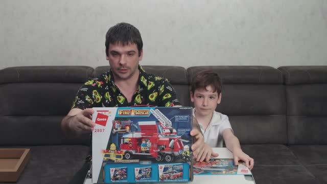 Конструктор блочный QMAN Спасательная Пожарная машина Fire Rescue command truck смотреть онлайн