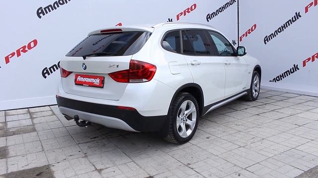 Обзор на BMW X1 Кроссовер 20d 2.0d AT (177 л.с.) 4WD Белый 2012г. смотреть онлайн