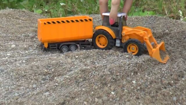 Распаковка строительного трактора - для детей смотреть онлайн