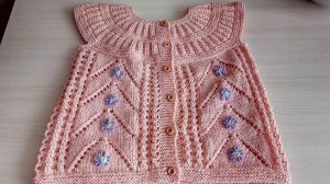 Вышивка на вязаном полотне.Цветы.