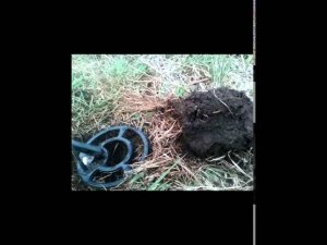 Поиск монет у старого колодца.