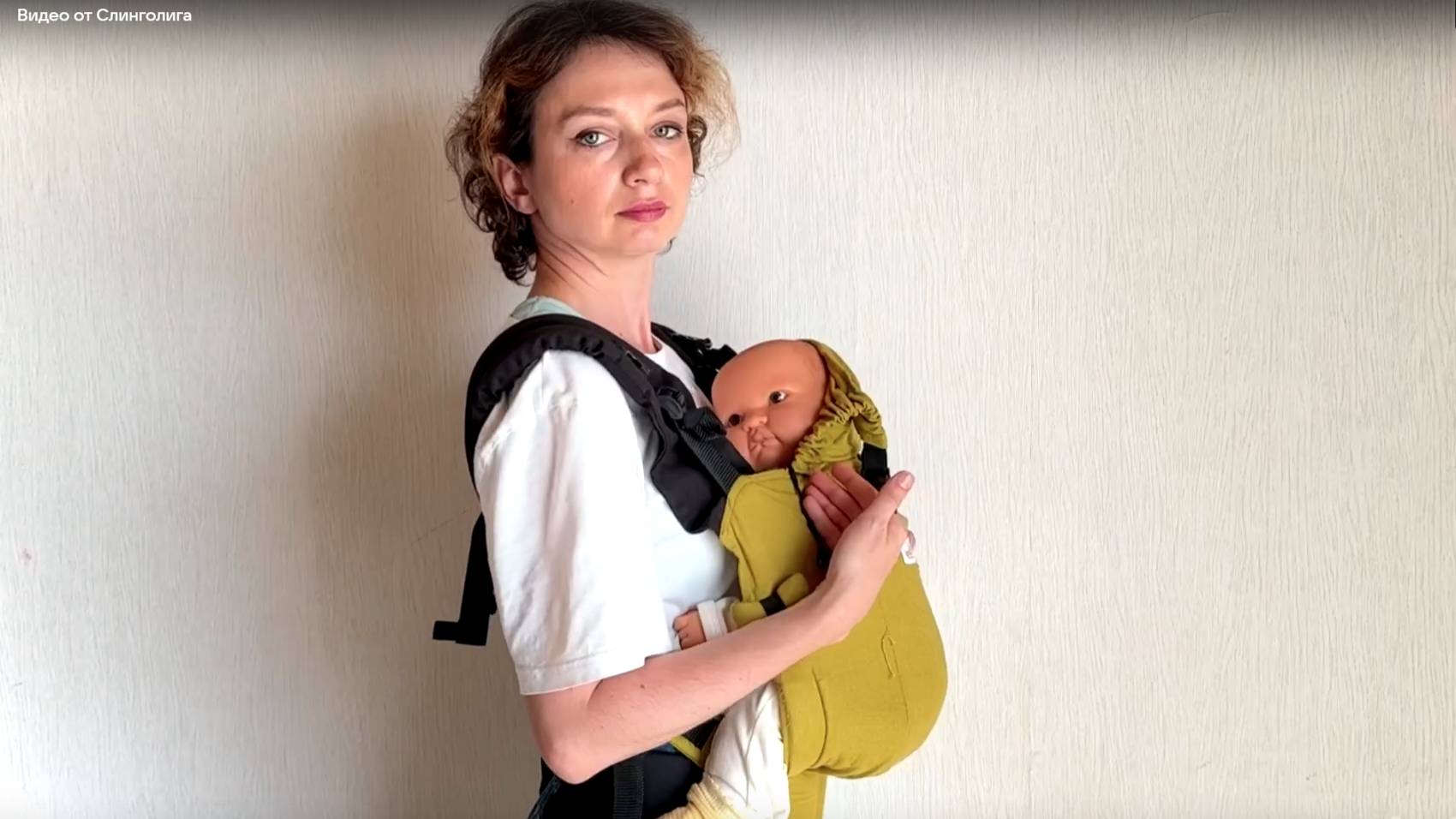 Адаптированный эргорюкзак с ребенком, который еще не сидит самостоятельно