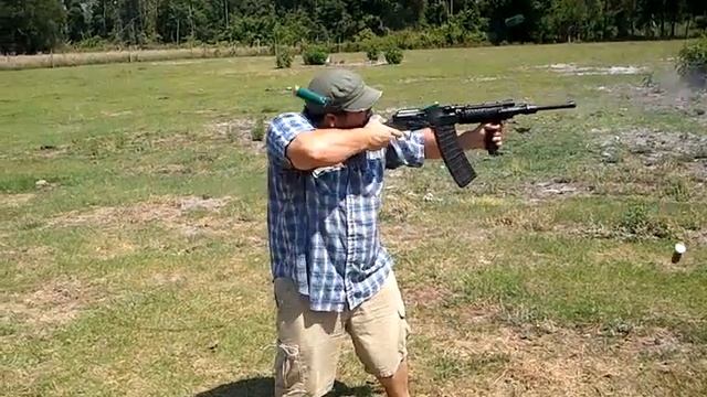 Stock Saiga 12 with quad rail and forearm grip. смотреть онлайн