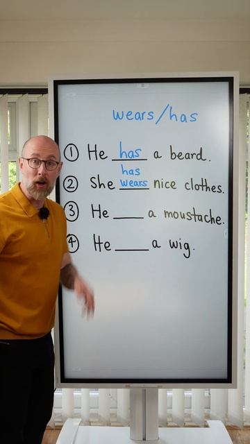 has & wears #learnenglish #grammar смотреть онлайн