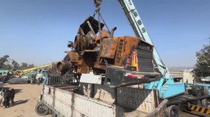 Процесс восстановления сгоревшего погрузчика.