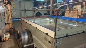 Подъемный тент для легкового прицепа.