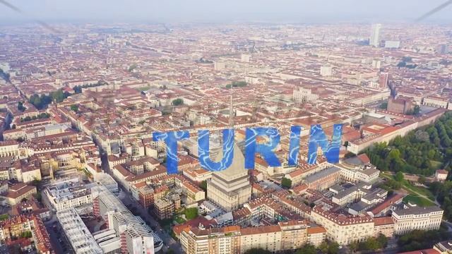 Inscription on video. Turin, Italy. Flight over the city. Mole Antonelliana - a 19th-century buildi смотреть онлайн