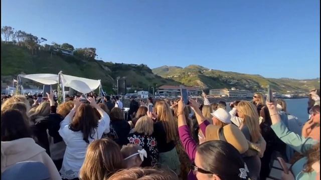 Chupa Of R' Shmuli And Shira Thaler On The Malibu Pier