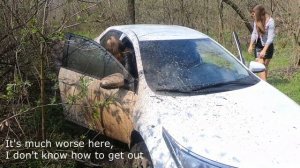 Two girls stuck hard in deep mud