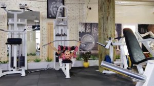 Contortion in gym. Extreme flexible poses.