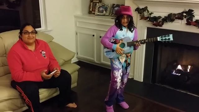 Sofia playing her Christmas gift guitar. 12/2014 смотреть онлайн